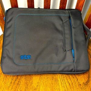 STM tablet bag. Almost new. Gray and blue with long strap. Padded bag